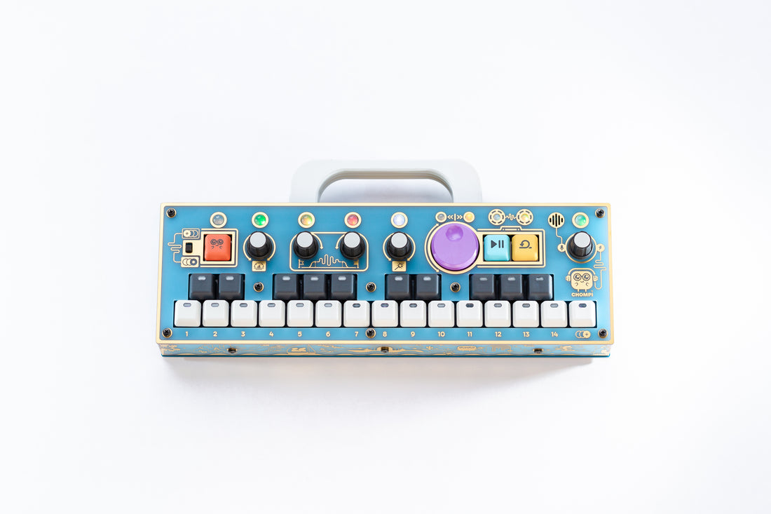 Top down view of Treasure Island CHOMPI: lagoon blue with Chase Bliss x CHOMPI graphics