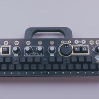 Rotating profile and closeup angles showcasing the Midnight Edition CHOMPI device